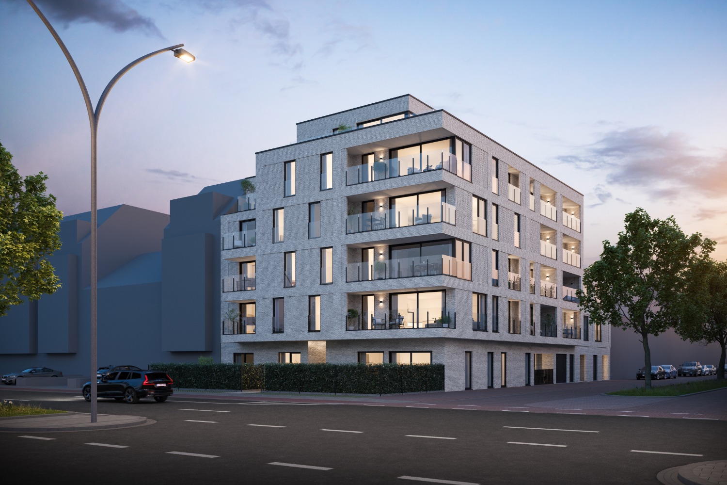 Residentie Sea Drive — gevelzicht bij avond