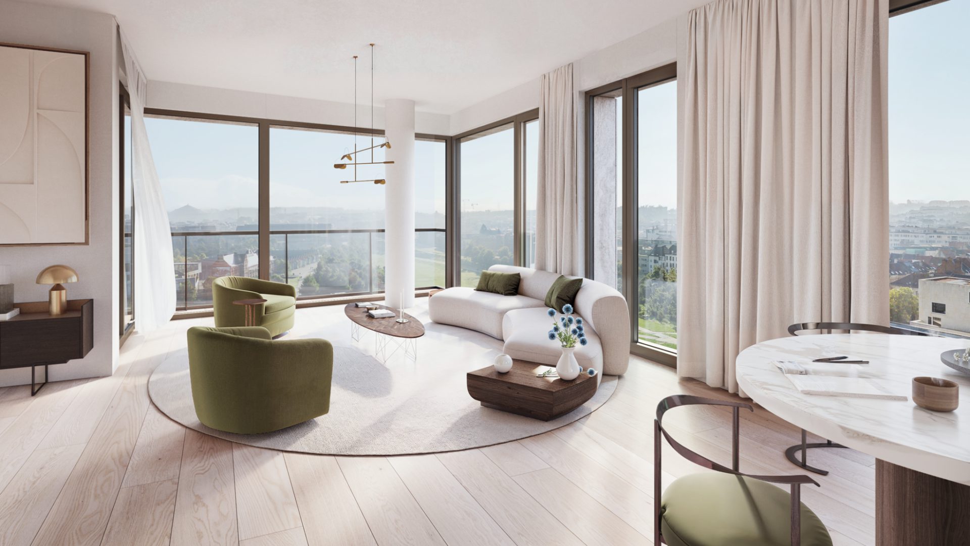 Living met groene fauteuils en marmeren werktafel