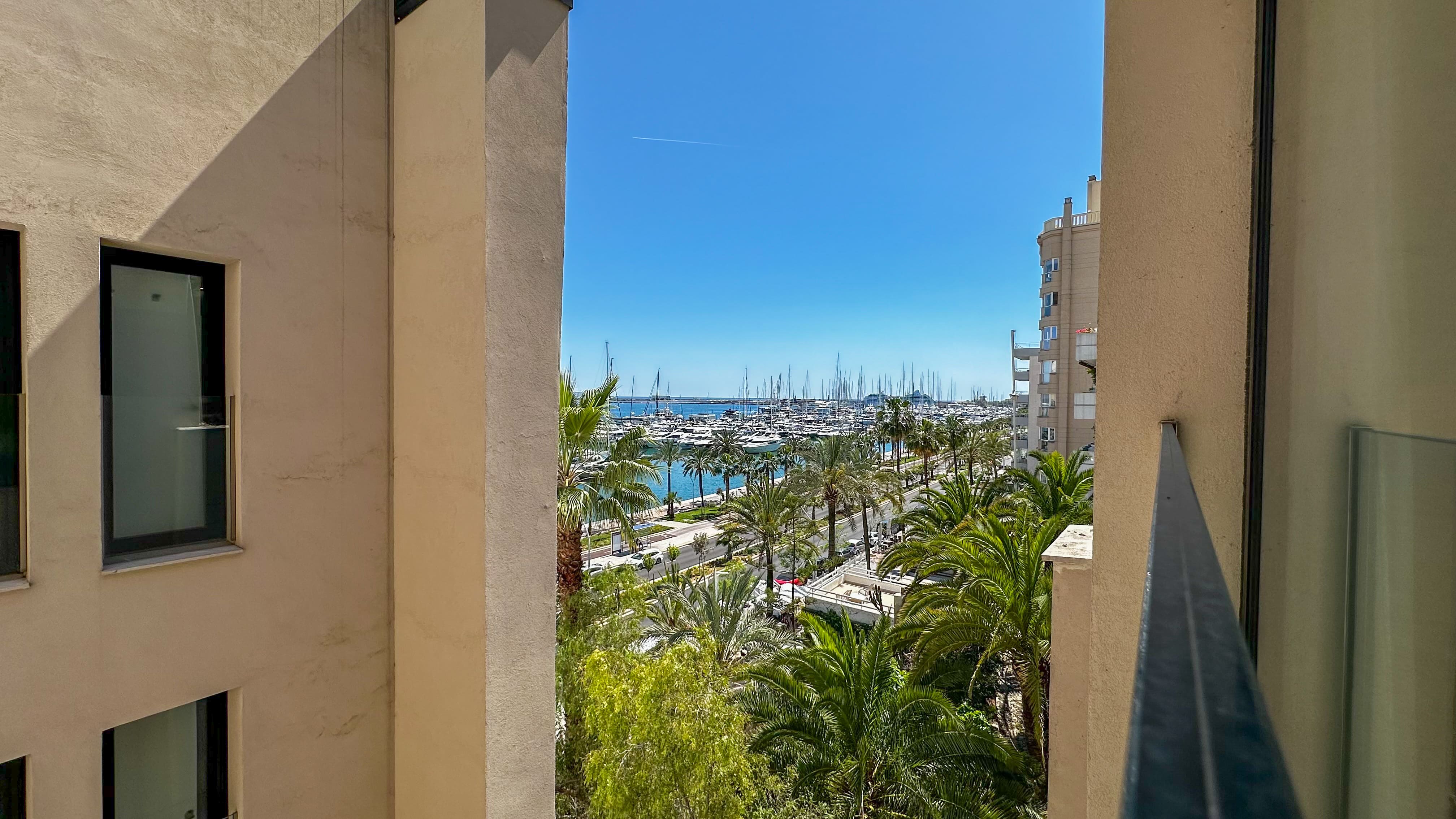 South-facing terrace with views of the harbour and sea