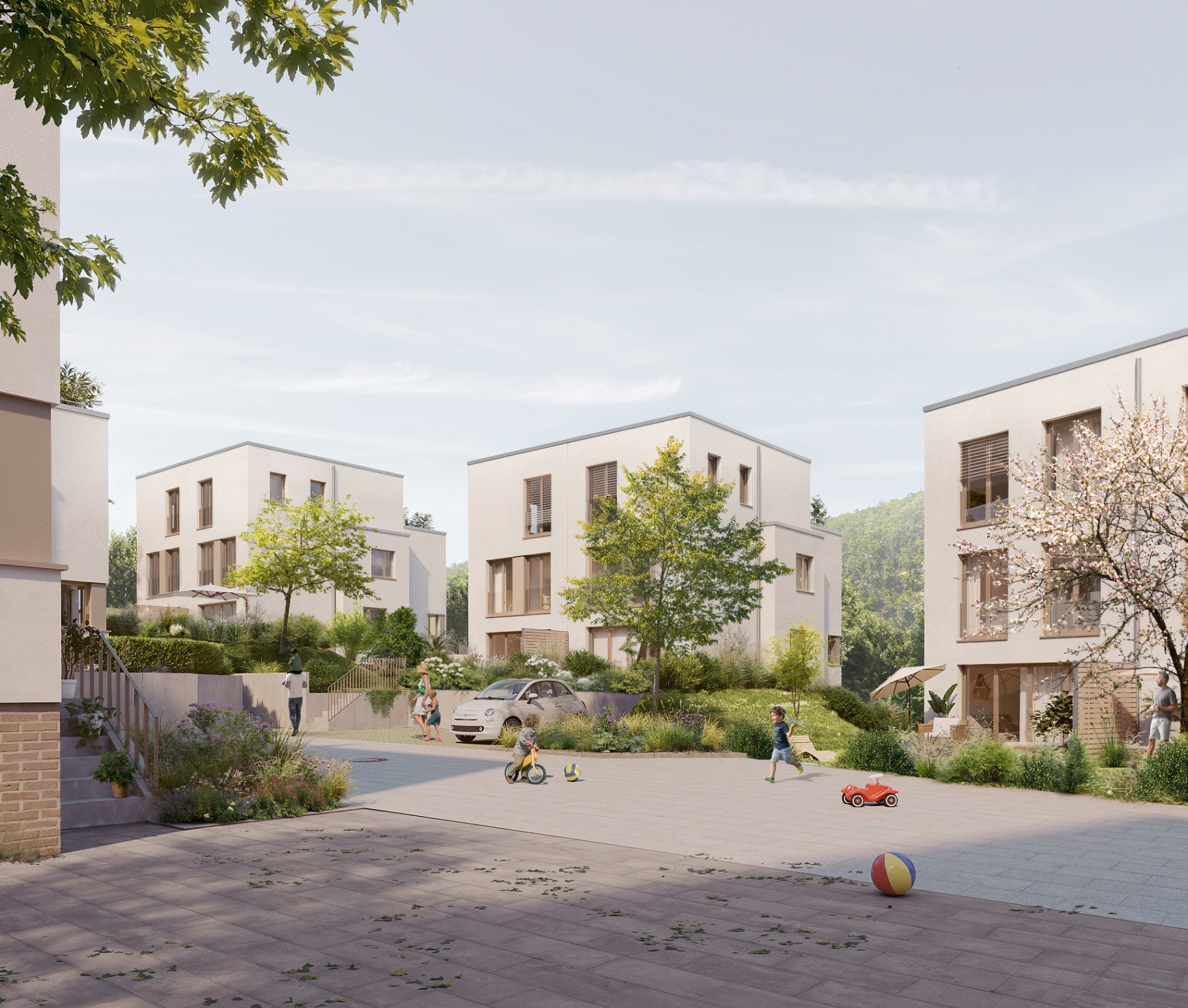 Shared courtyard with houses and a green outdoor area