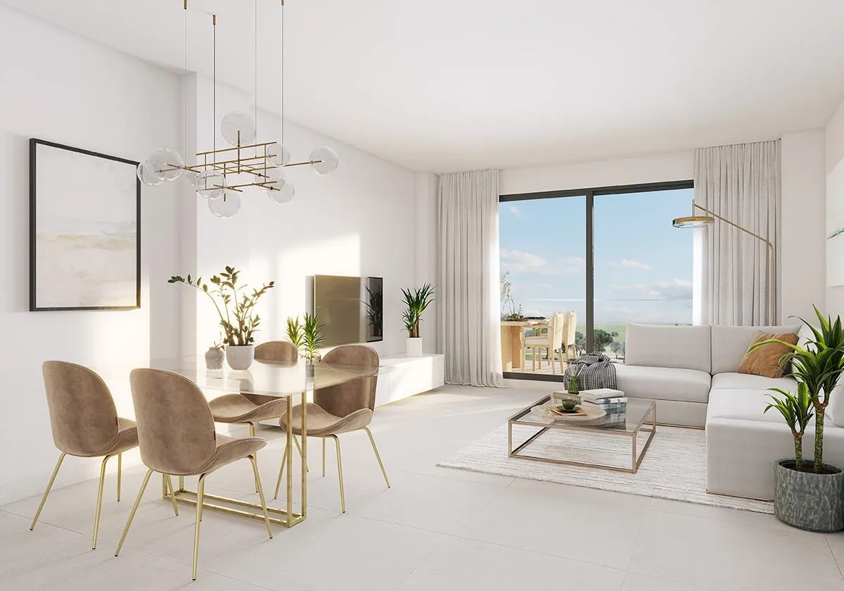 Lichte leefruimte met eettafel in een Abril-appartement