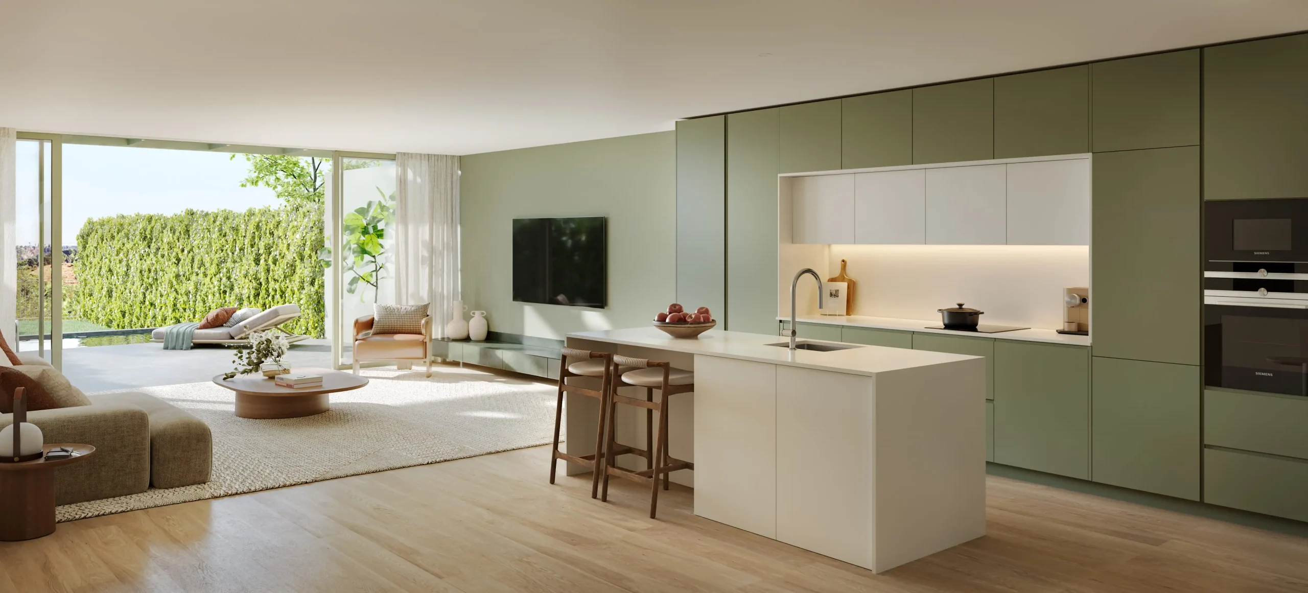 Open leefruimte met keuken en doorkijk naar de tuin