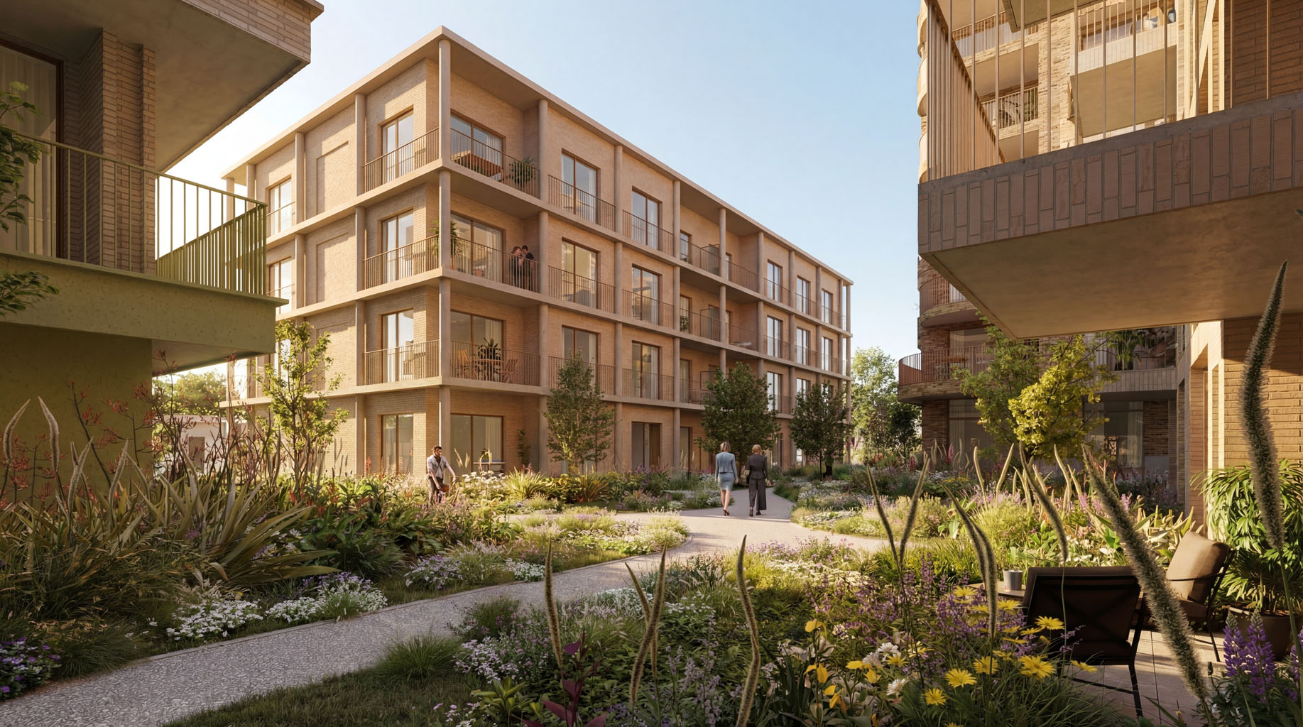 Ankerhavn: baksteengevels met ronde balkons rond een groene binnentuin op de Oosteroever in Oostende