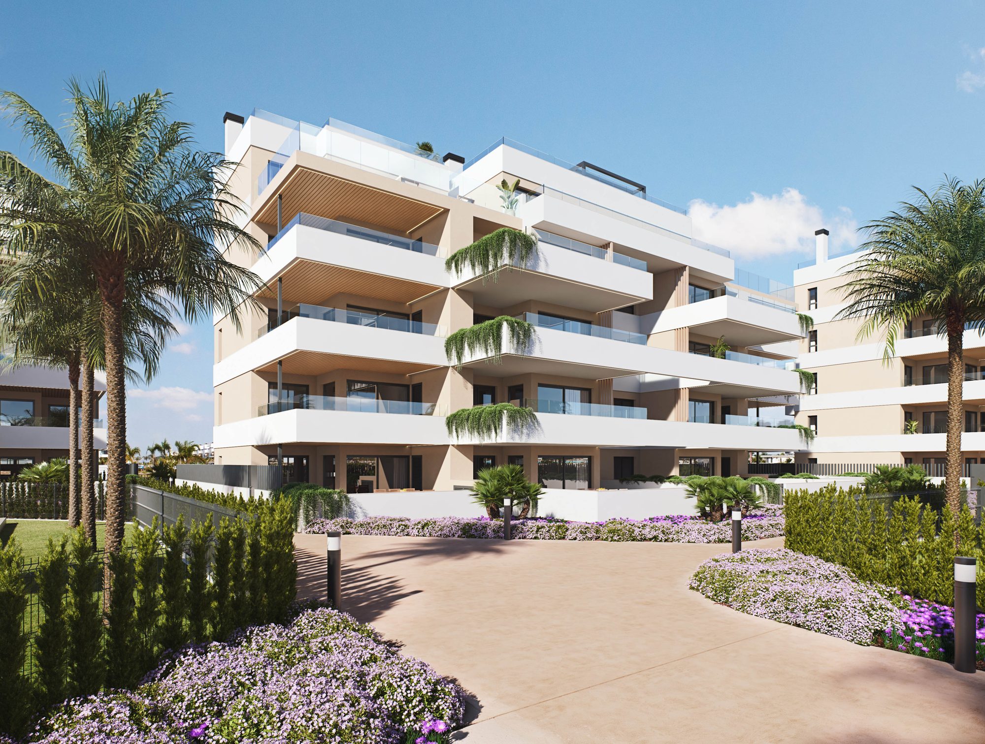 The buildings of Olivo 19 with spacious terraces and gardens