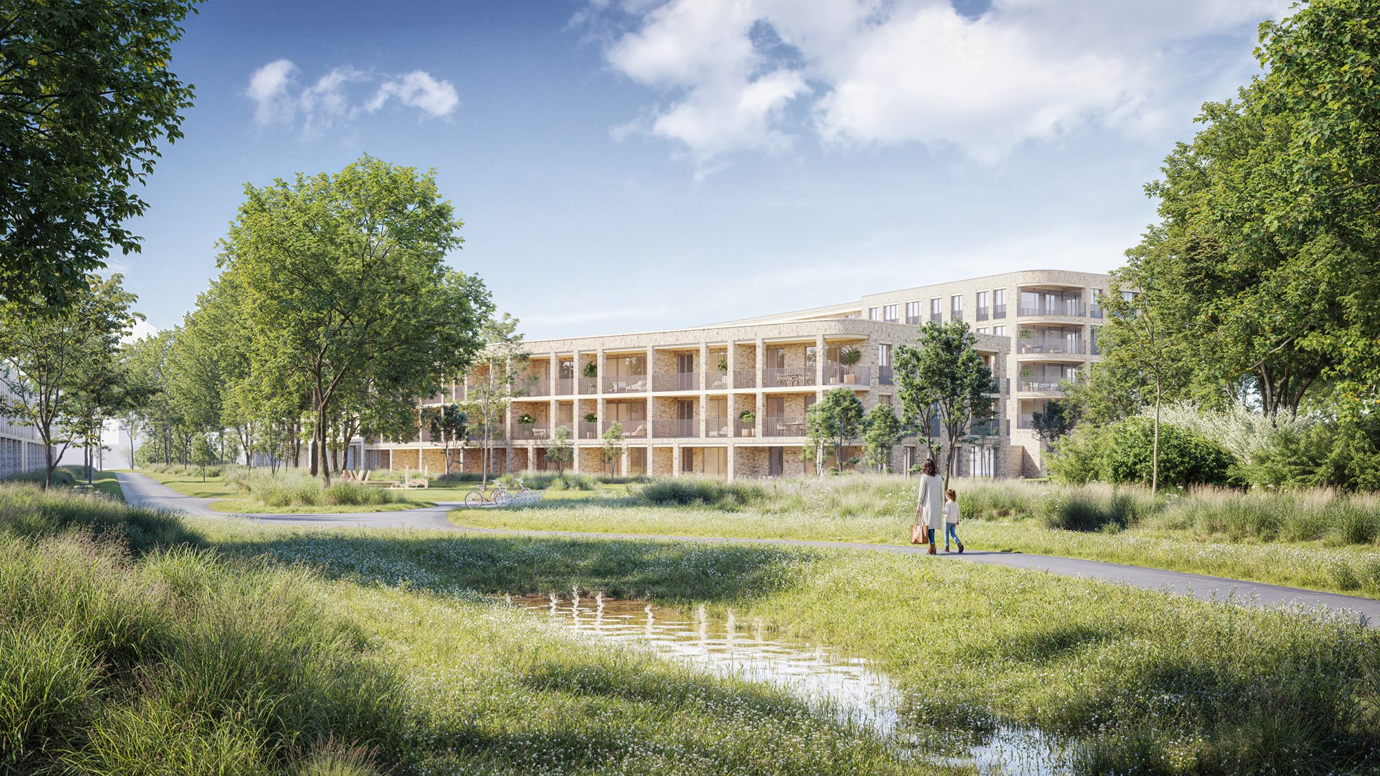 Groene buitenruimte met wandelpad en waterpartij tussen de appartementen