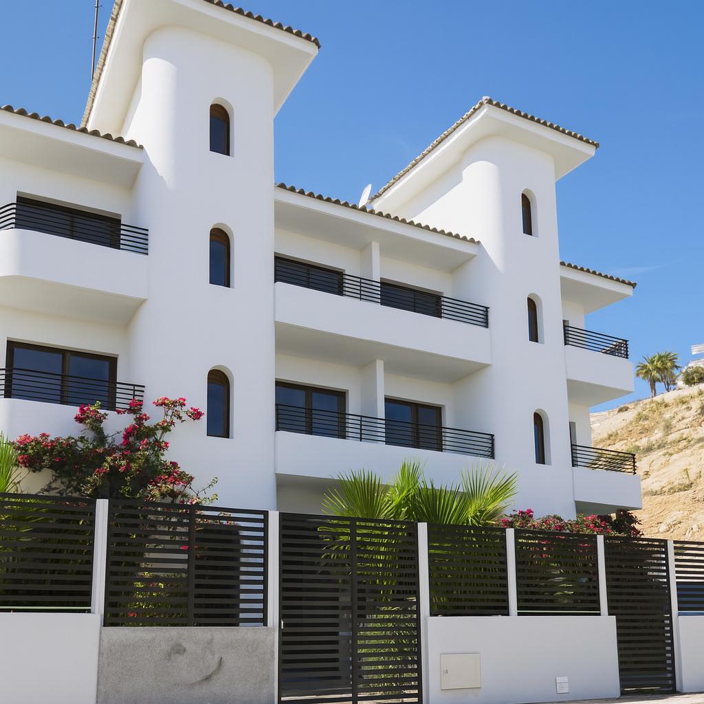 Side façade with balconies and bougainvillea