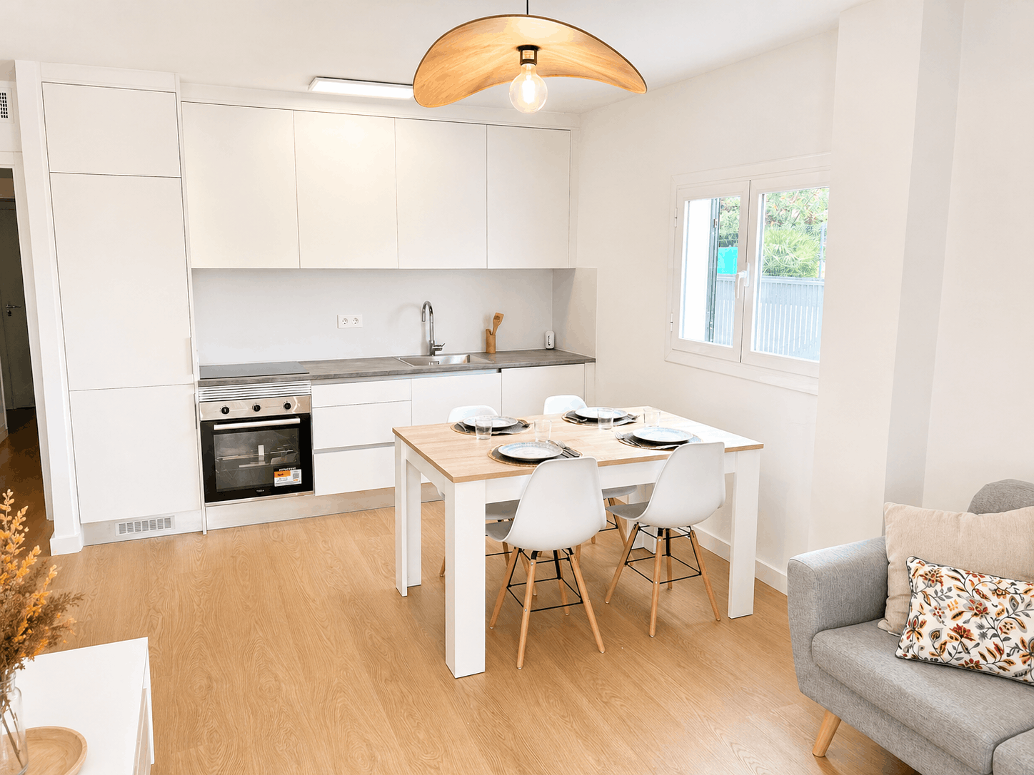 Designer kitchen with bar and dining area