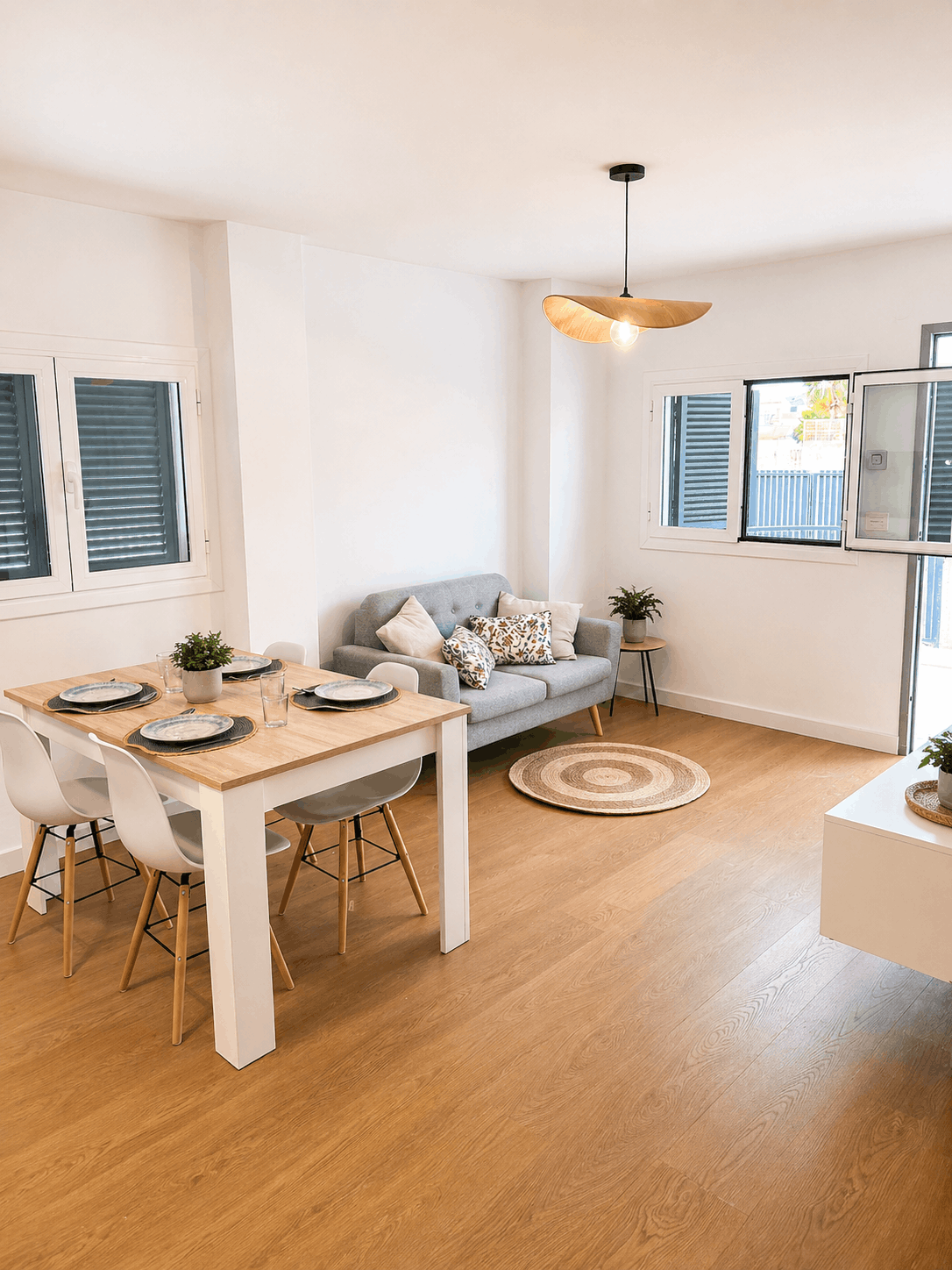 Bright open-plan living room with terrace doors