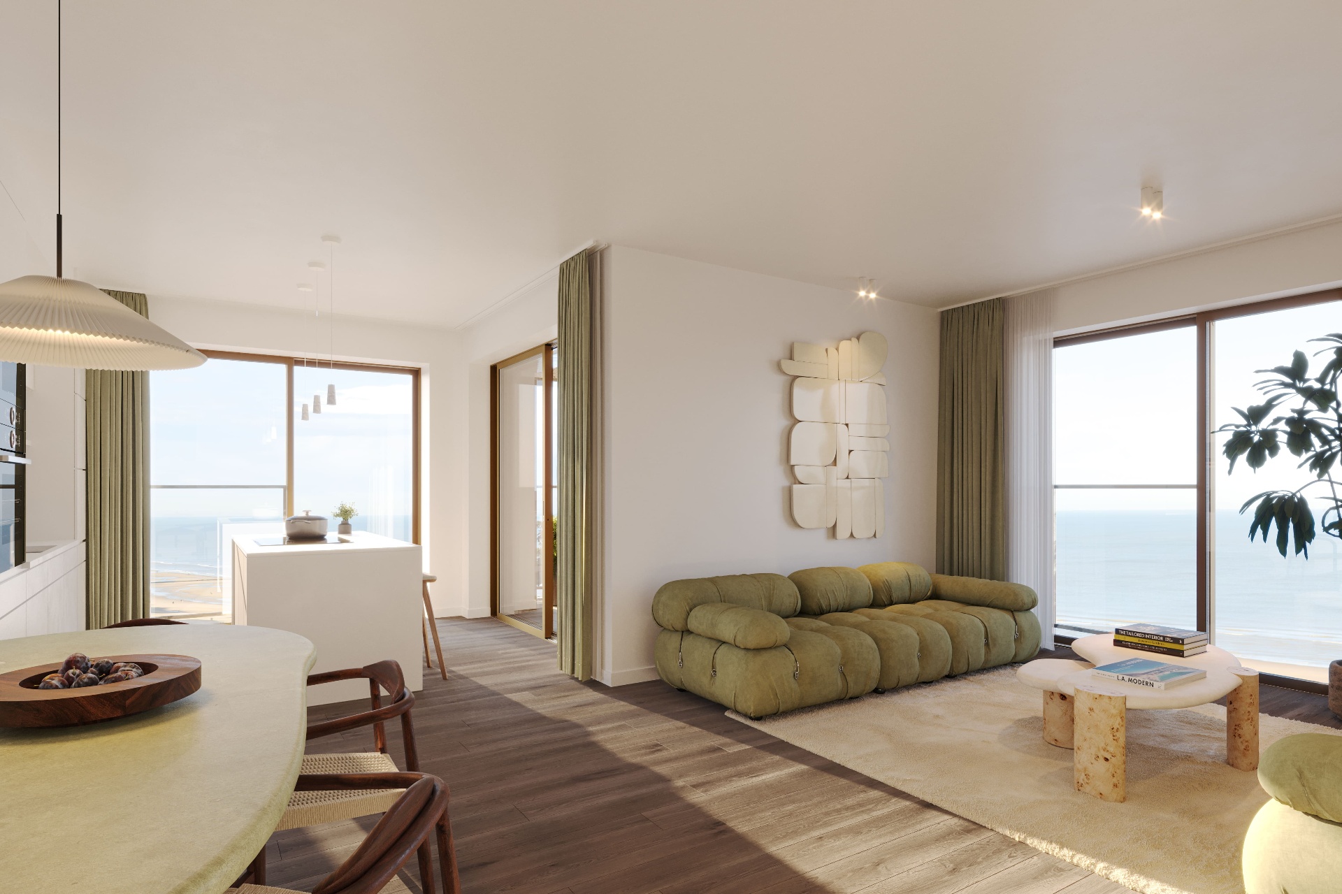 O'Sea interieur — leefruimte met groene Camaleonda en panoramisch zeezicht